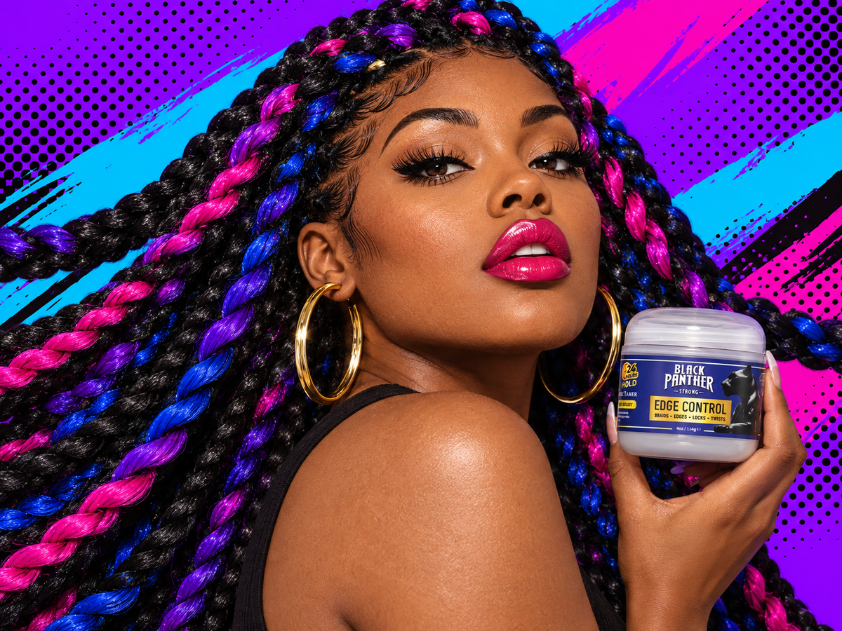 Model in braids holding Black Panther Strong Edge Control